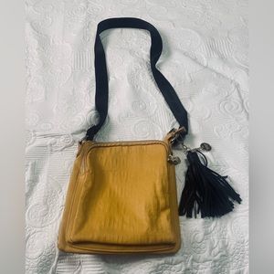 Yellow Steve Madden crossbody purse